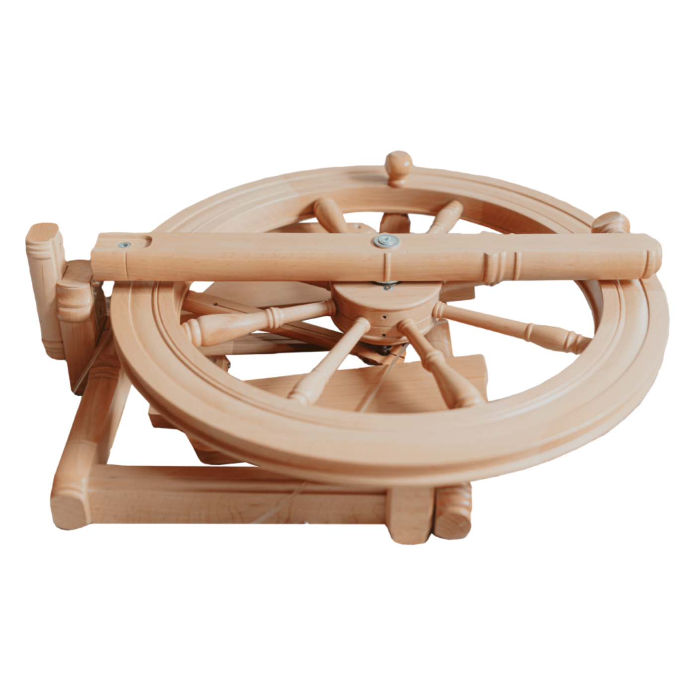 Folded Kromski Sonata Encore spinning wheel on white background, showing compact travel-ready frame and integrated carry shape.