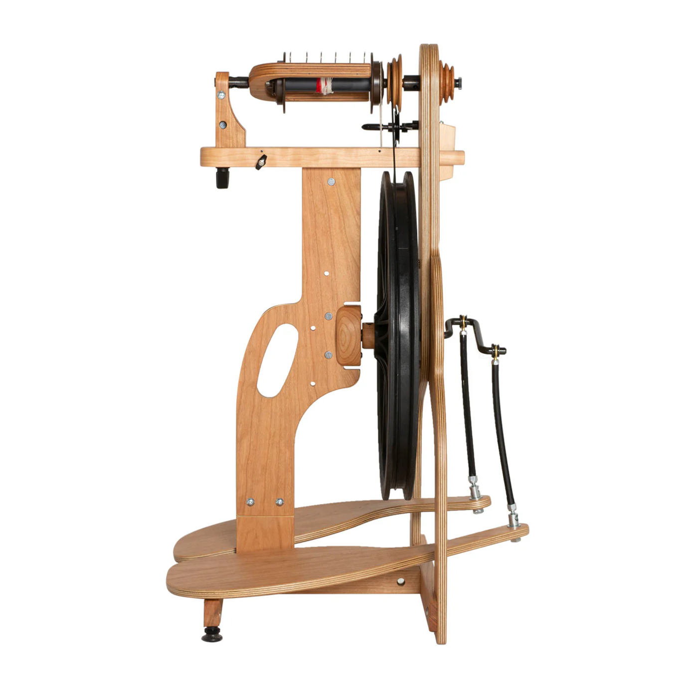 Side profile of the Schacht Ladybug Limited Edition cherry spinning wheel—black drive wheel, flyer assembly, and treadle base visible.