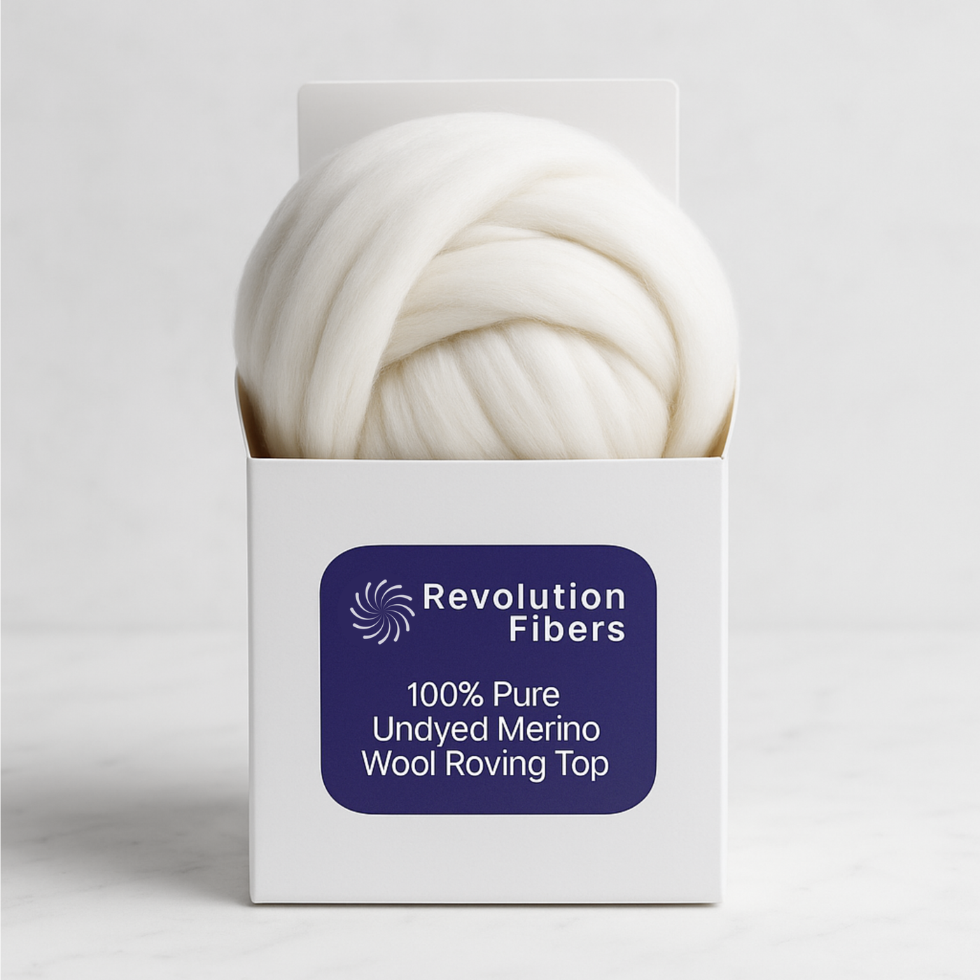 Boxed product shot—Revolution Fibers 1 lb 100% Pure Undyed Merino Wool Roving Top, ready for spinning, felting, and weaving.