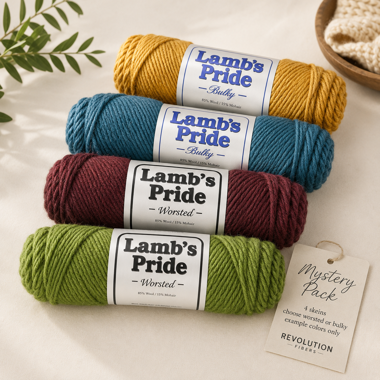 Four Brown Sheep Lamb’s Pride skeins in different colors stacked together as an example Mystery Yarn Pack assortment.