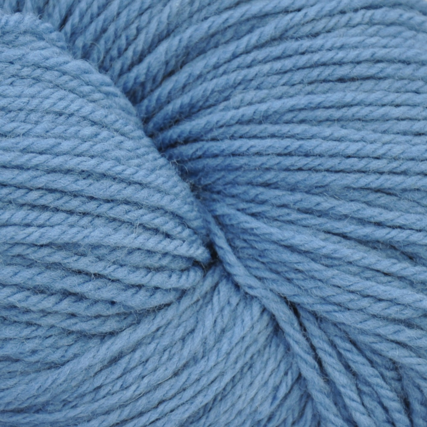Brown Sheep Prairie Spun DK yarn skein in Wedgewood blue, at Revolution Fibers