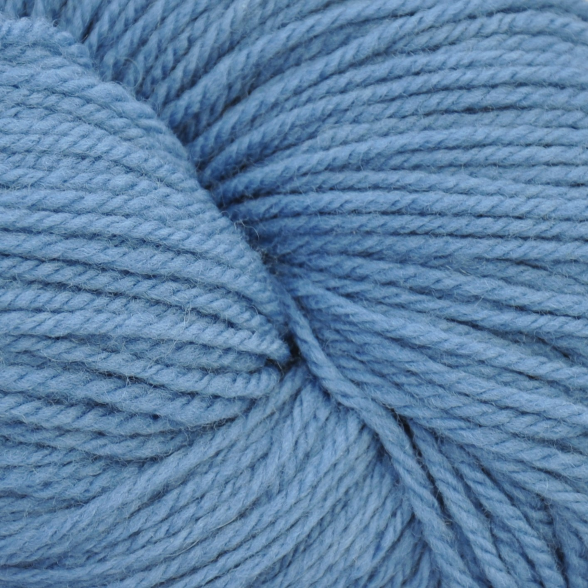 Brown Sheep Prairie Spun DK yarn skein in Wedgewood blue, at Revolution Fibers
