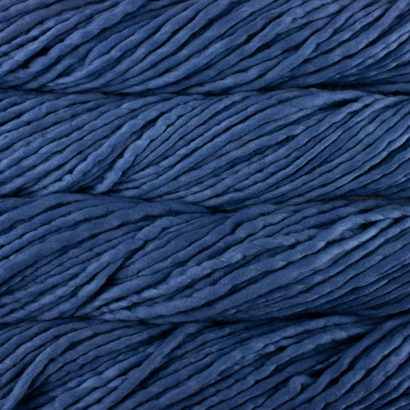 Super Bulky Malabrigo Rast Hand-dyed yarn in the dusty navy blue colorway Denim.