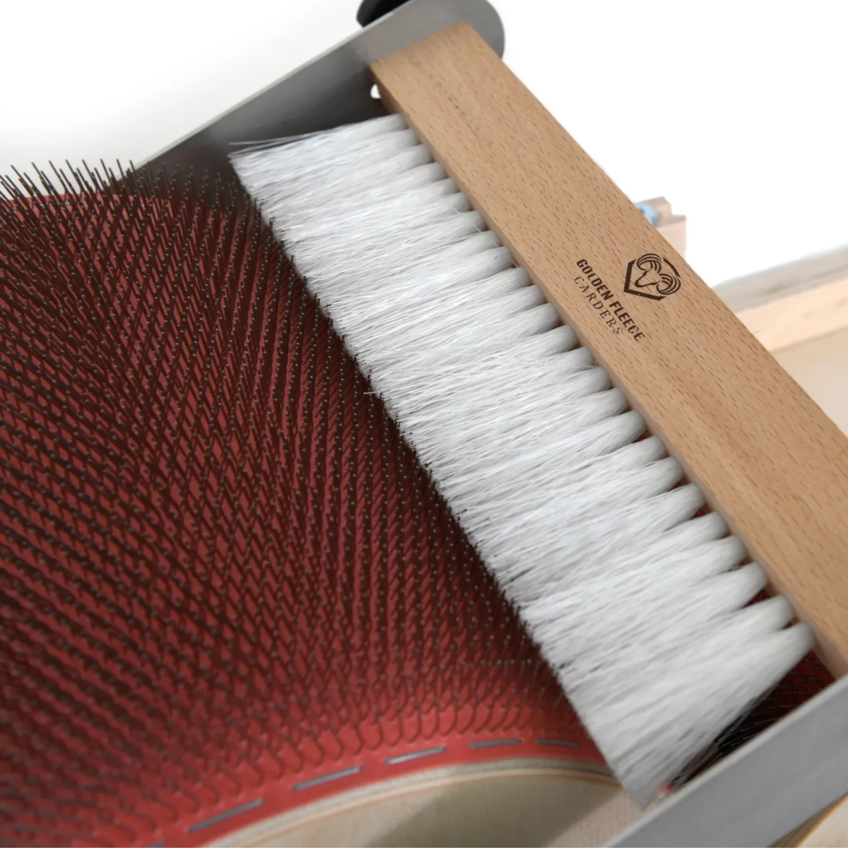 Golden Fleece 120 TPI drum carder with Packer Brush positioned over the fine main drum carding cloth.