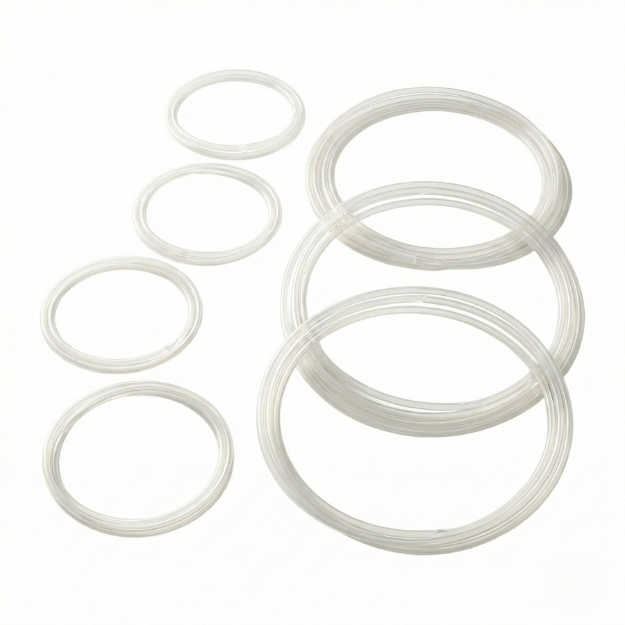 Top-down view of Kromski polyurethane drive band loops in graduated sizes for Kromski spinning wheels on a clean light background.