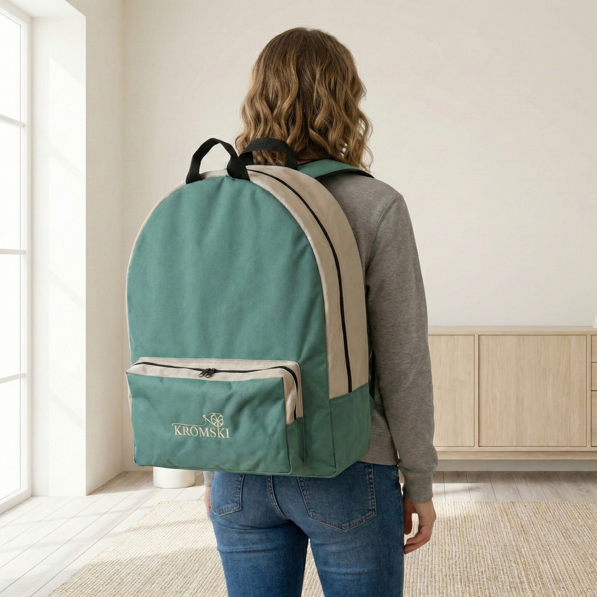 Person wearing the Kromski Sonata spinning wheel bag as a backpack, showing portable carry for classes, guild meetings, and trips.