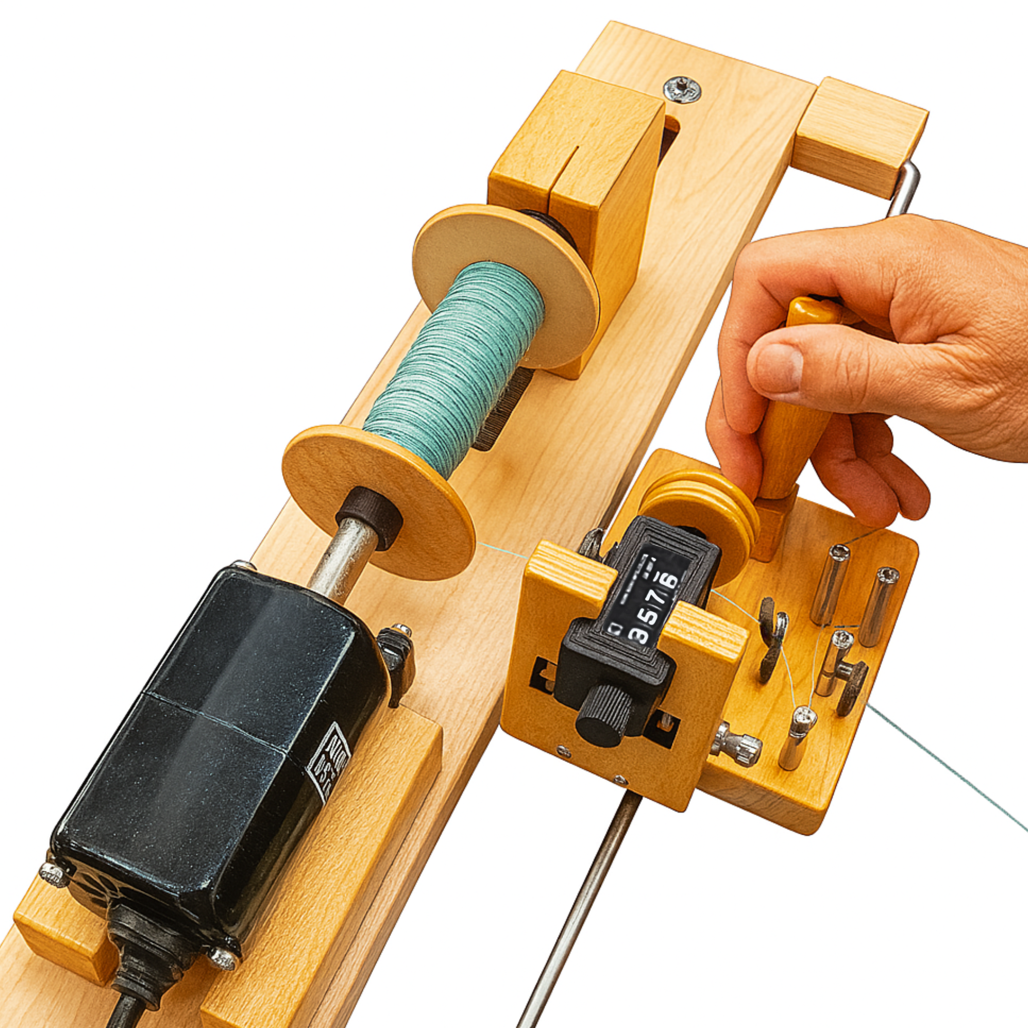 Leclerc Electric Bobbin Winder Complete mounted on maple base, showing motor, tension posts, and four‑digit yardage counter as green yarn winds onto a spool.