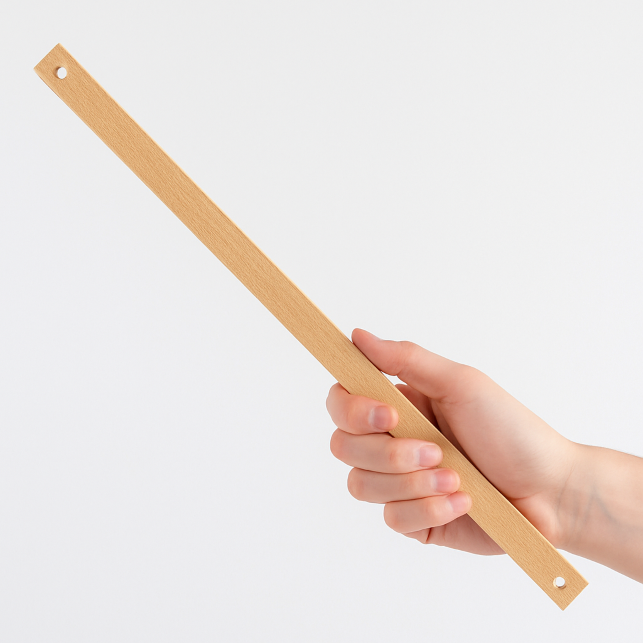 Hand holding a Leclerc Wooden Lease Stick, showing size, finish, and hole placement for weaving loom use