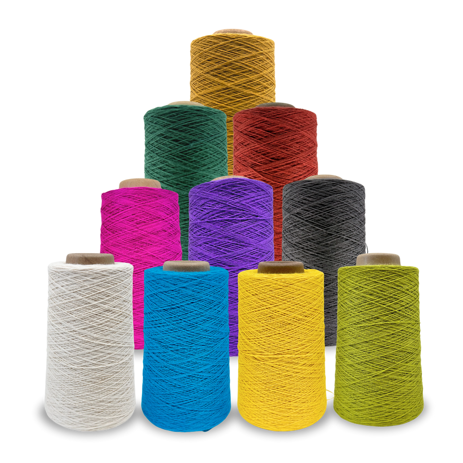 Ten vibrant cones of Lofty 8/4 Cotton Yarn in assorted colors including Natural, turquoise, lemon yellow, key lime, charcoal, amethyst, magenta, fir green, cayenne, and gold, stacked in a pyramid arrangement on a transparent background.