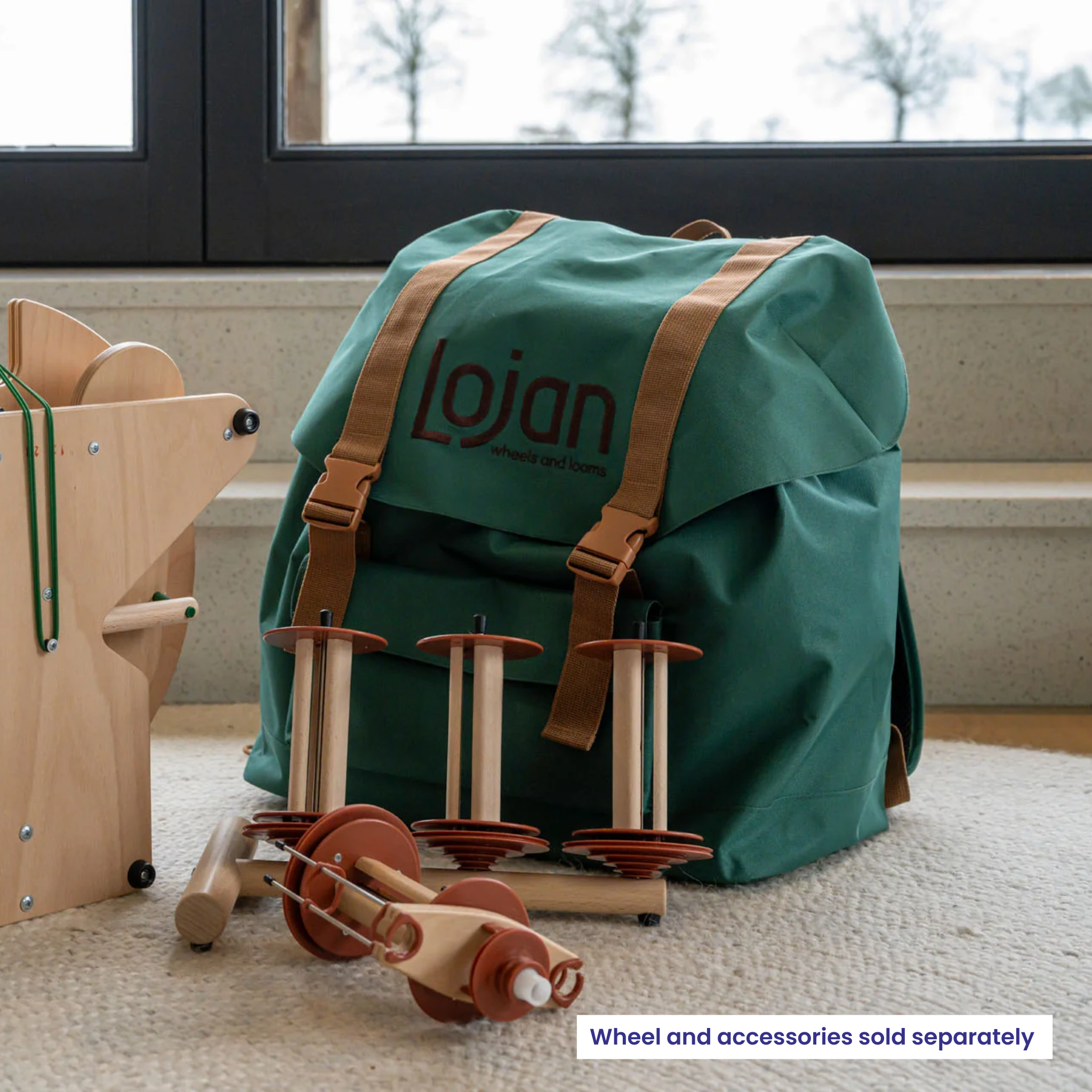 Lojan Travel Buddy Backpack shown with bobbins, flyer and Lazy Kate—recycled-PET spinning-wheel travel bag with roomy accessory storage