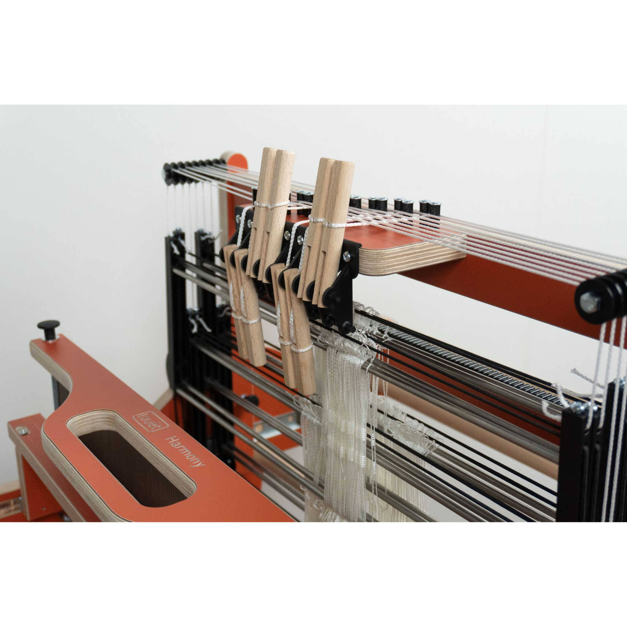 Louet Harmony Loom Terracotta – Side angle with beater, shafts, and warp beam
