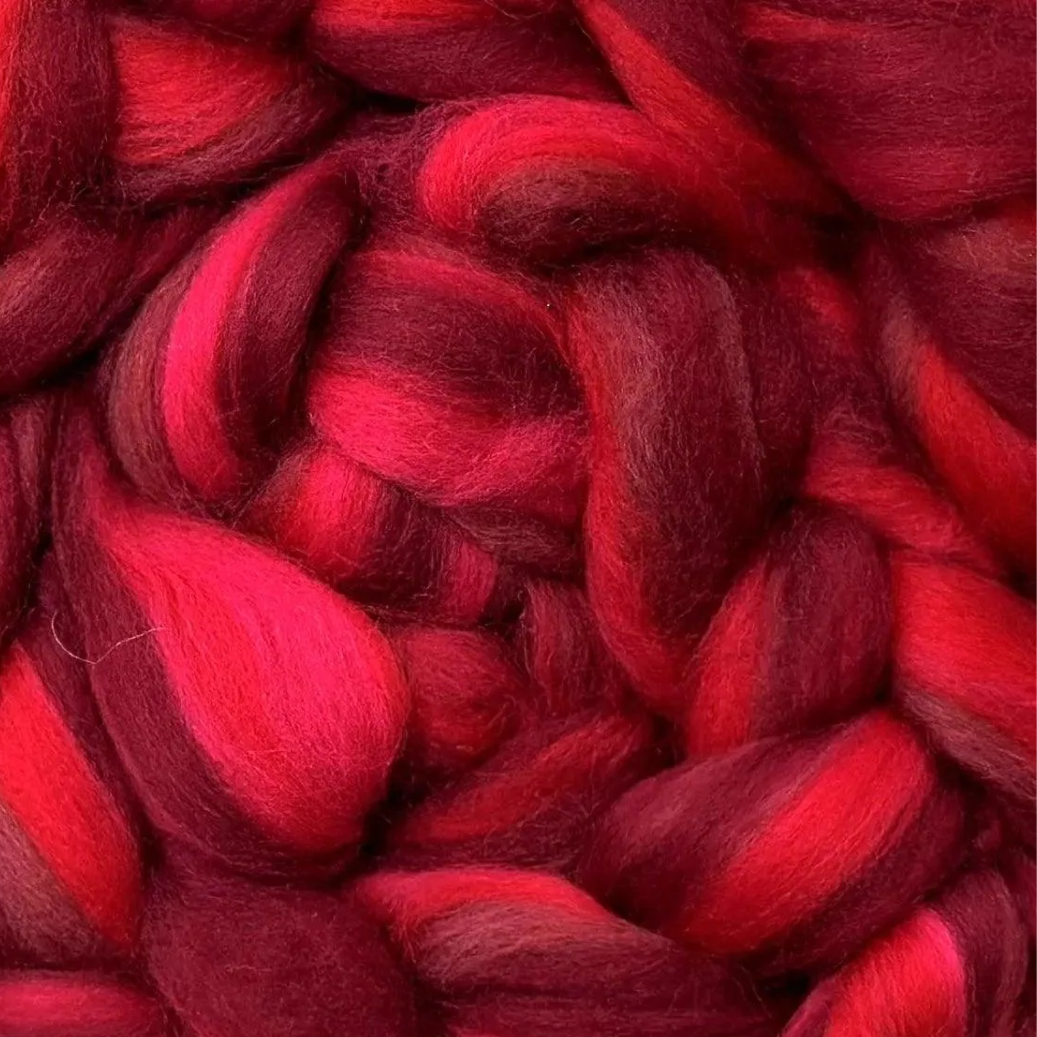 “Passion” Luminoso merino wool top—deep red gradient fiber perfect for spinning, needle-felting accents