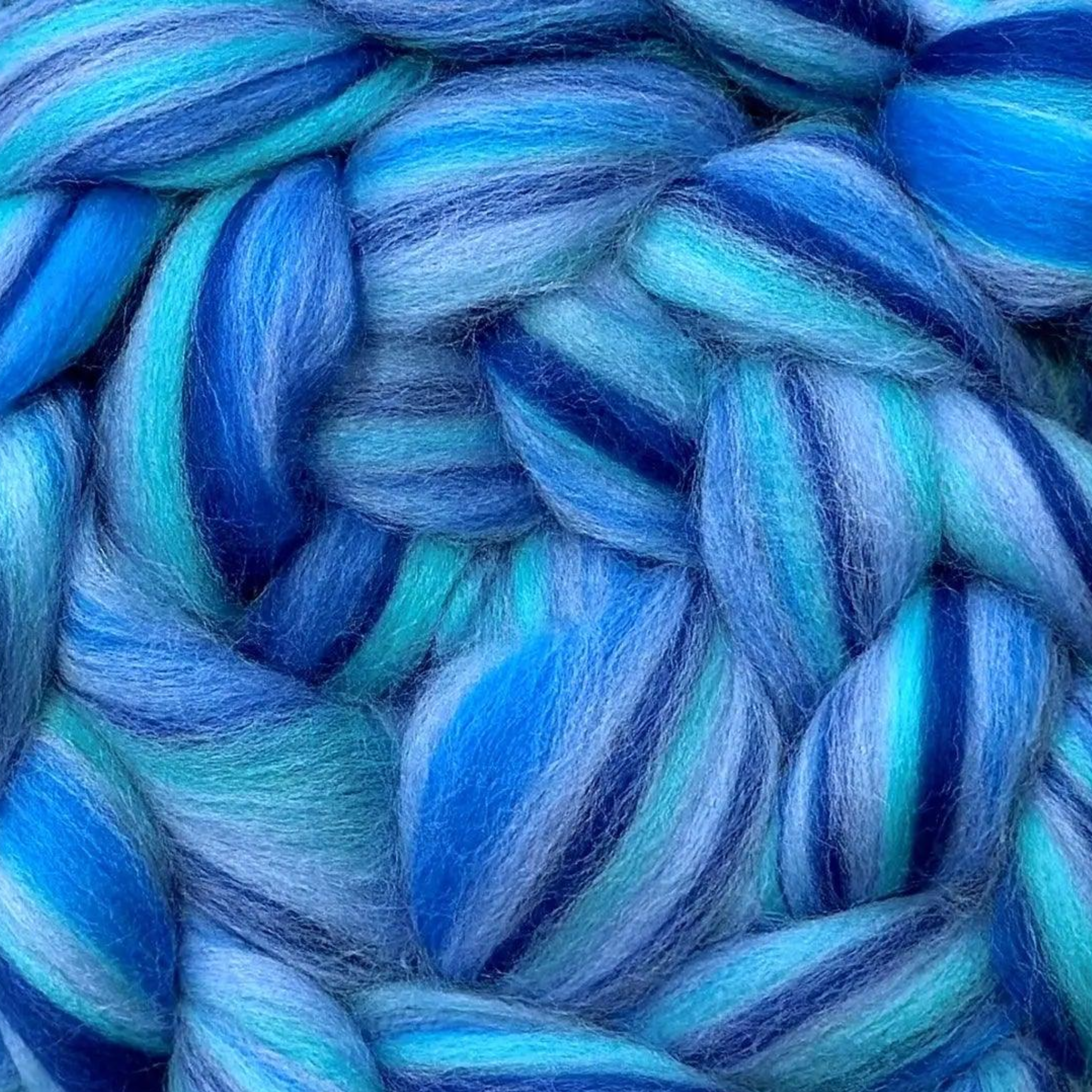 “Tranquil” Luminoso merino wool top—ocean blues braid, ideal for hand-spun yarn & felt landscapes