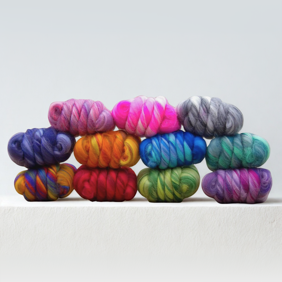 Luminoso merino roving pack stacked in two tiers showing all 11 hand-dyed color blends