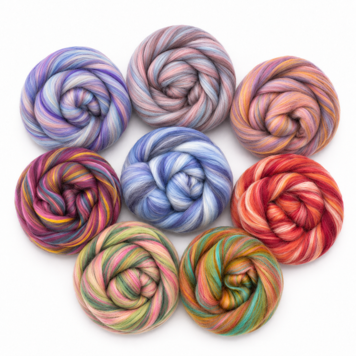 Studio group portrait of the eight Revolution Fibers Bambino Range Roving tonal blends on white, from cool Duckle Daisy and Tweedledee through vivid Bonnie Bee, Twinkle Twinkle and Higgledy Piggledy.