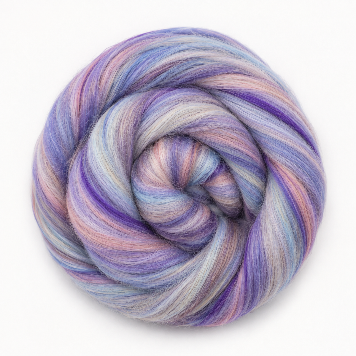 Duckle Daisy colorway of Revolution Fibers Bambino Range Roving, blending lavender, periwinkle blue, soft pink and creamy pale tones.