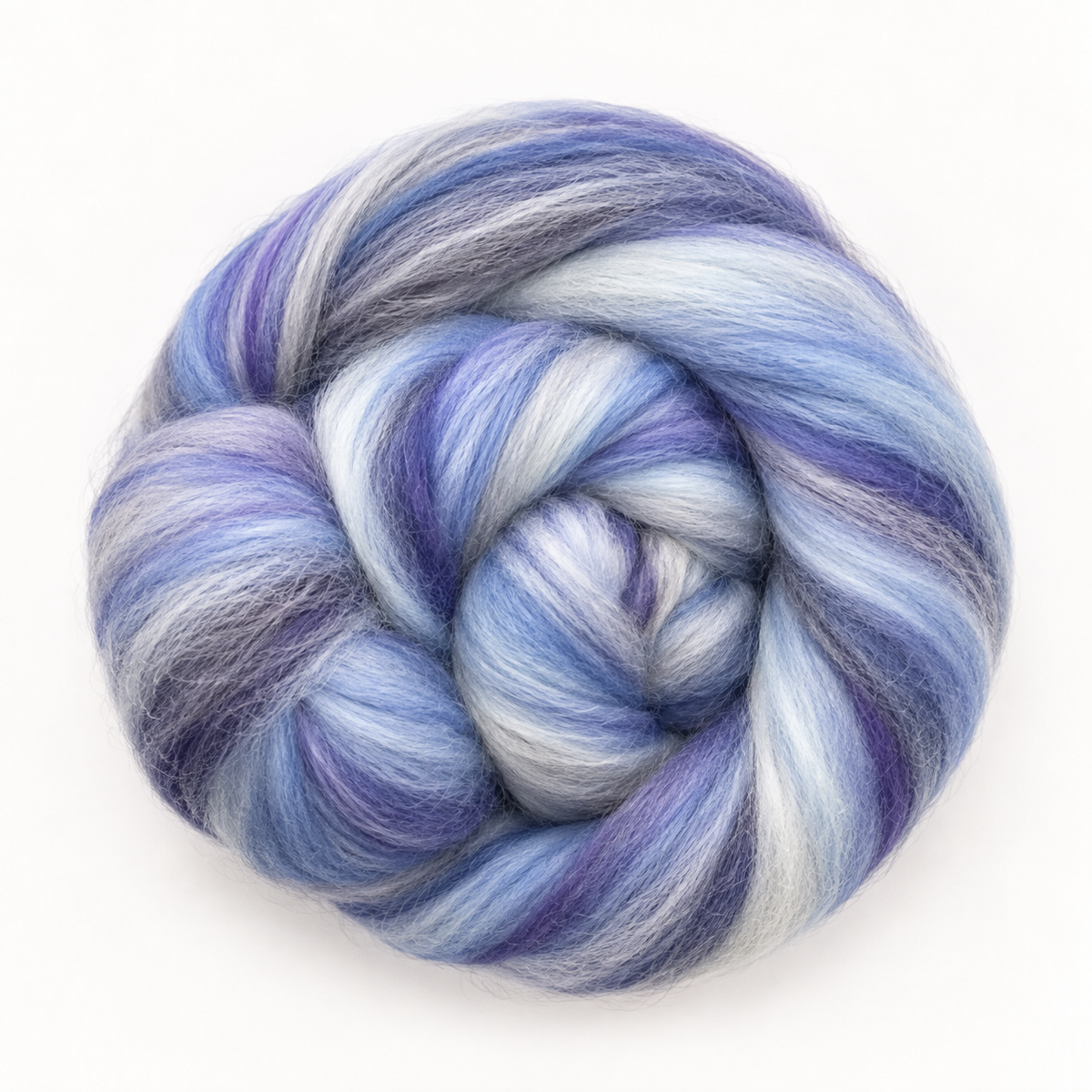 Cool blue, icy white, lavender and violet define Tweedledee, shown here as a wound top of Revolution Fibers Bambino Range Roving.