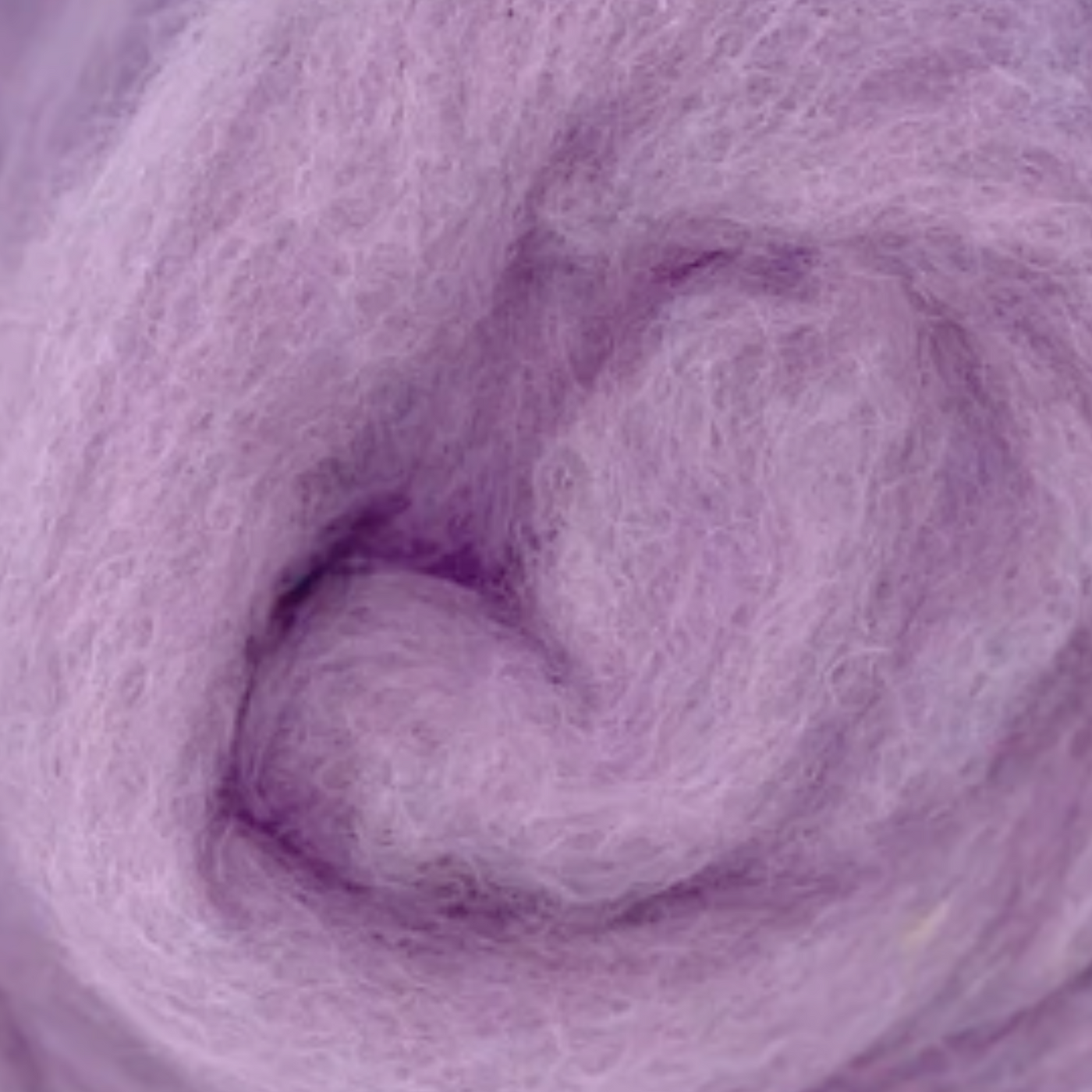 Close-up of Lavender colorway from the Revolution Fibers Fairytale Pastels Carded Corriedale Wool Sliver Pack.