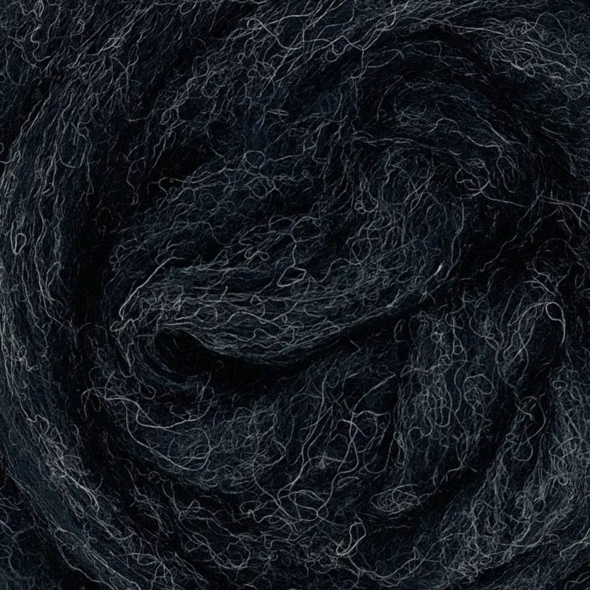 Thunder colorway from Revolution Fibers Grey Spectrum Corriedale Wool Sliver Variety Pack, dark charcoal gray carded wool fiber for felting, spinning, and fiber crafts.