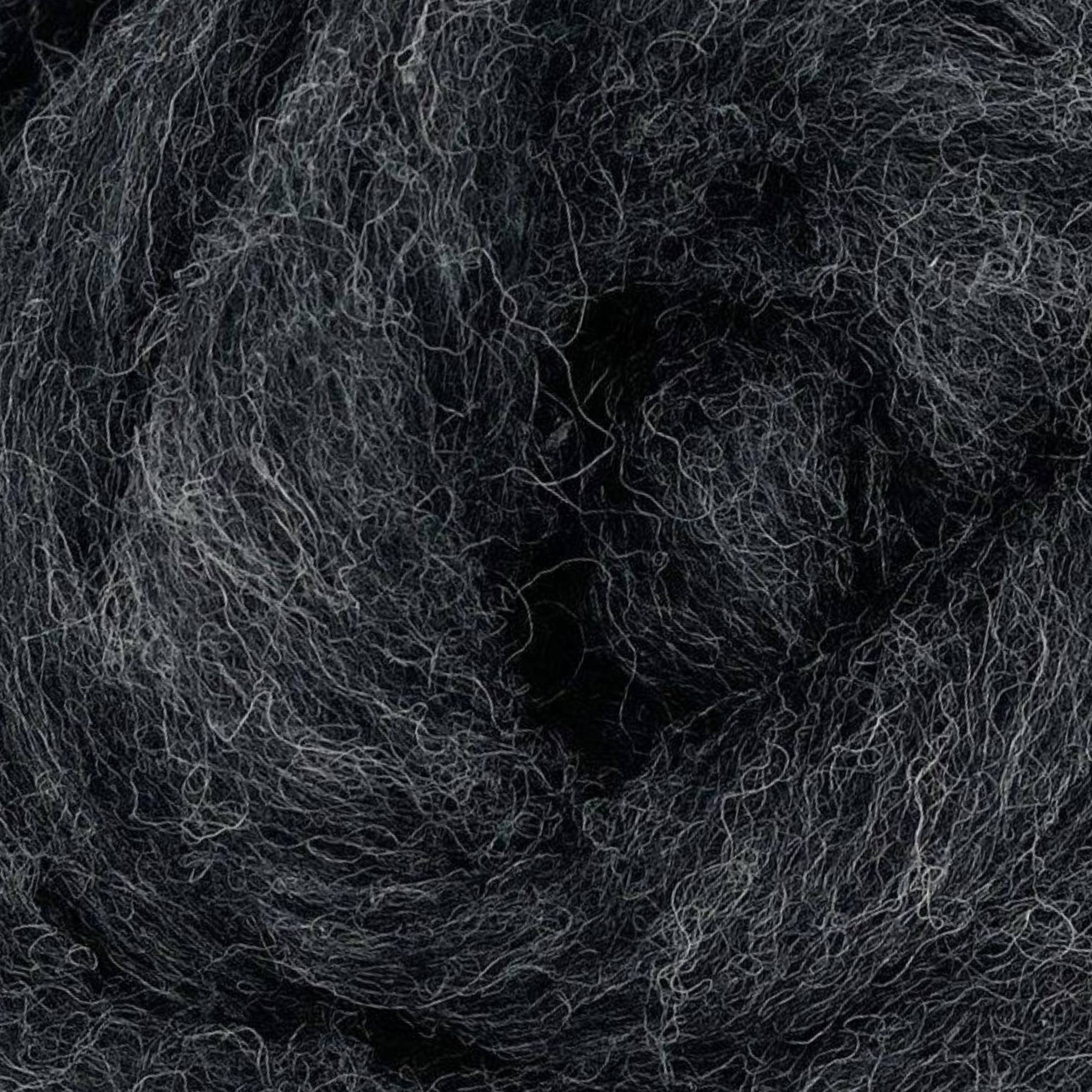 Windstorm colorway close-up from Revolution Fibers Grey Spectrum Carded Corriedale Wool Sliver, stormy gray wool fiber for felting, blending, and colorwork projects.