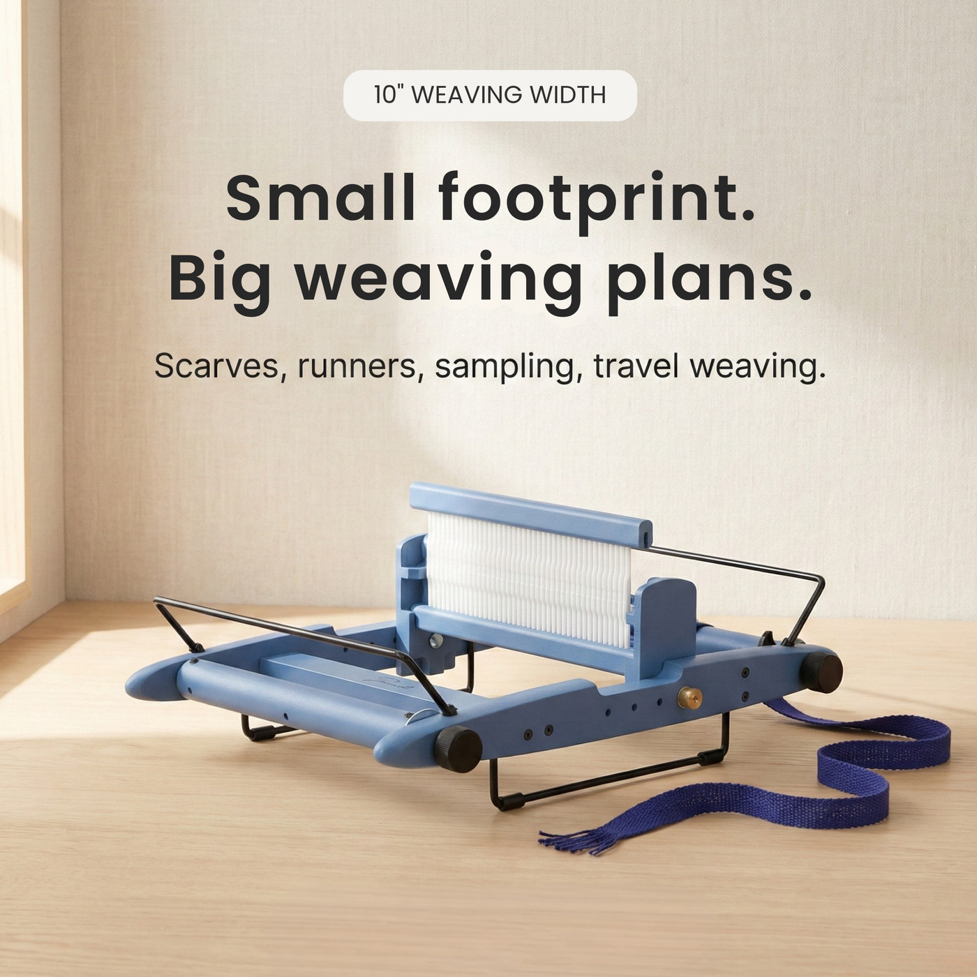 Kromski Presto Harbor Blue 2026 10-inch rigid heddle loom on light wood table with indigo woven strap; made for travel weaving.