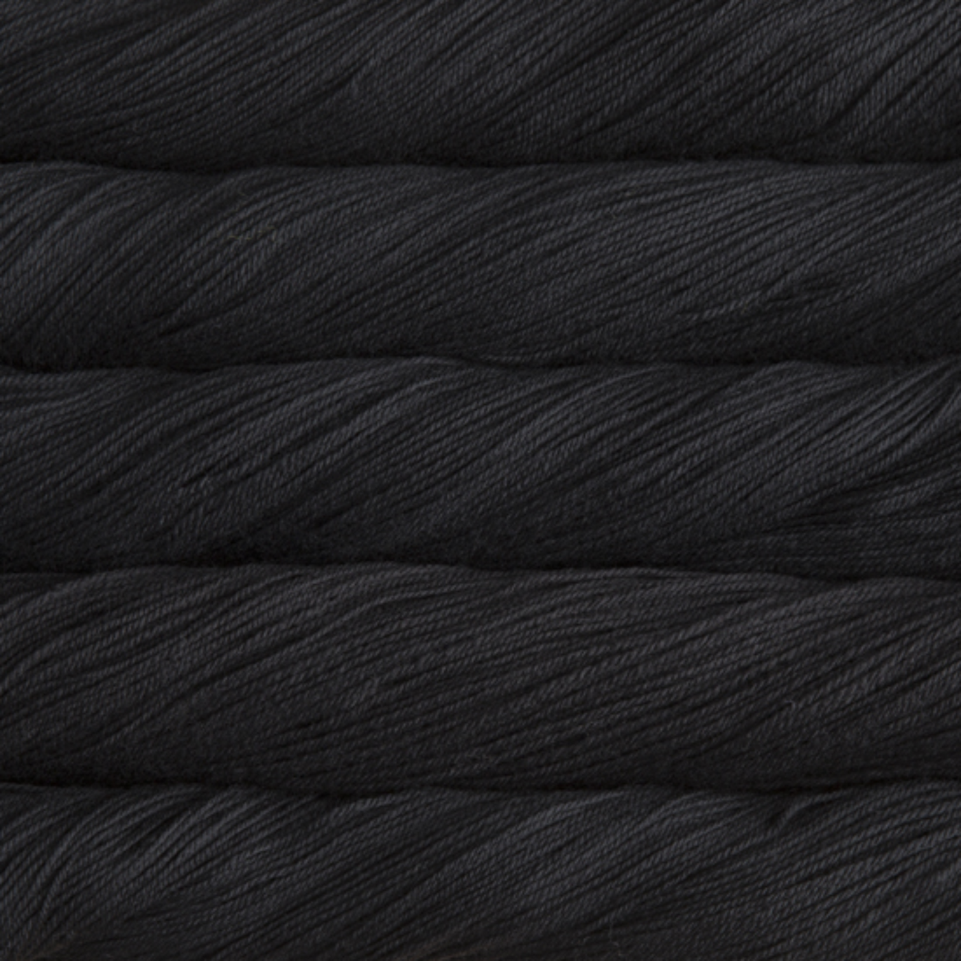 Malabrigo Sock Yarn Black SW195 – Solid black superwash Merino fingering yarn by Revolution Fibers.