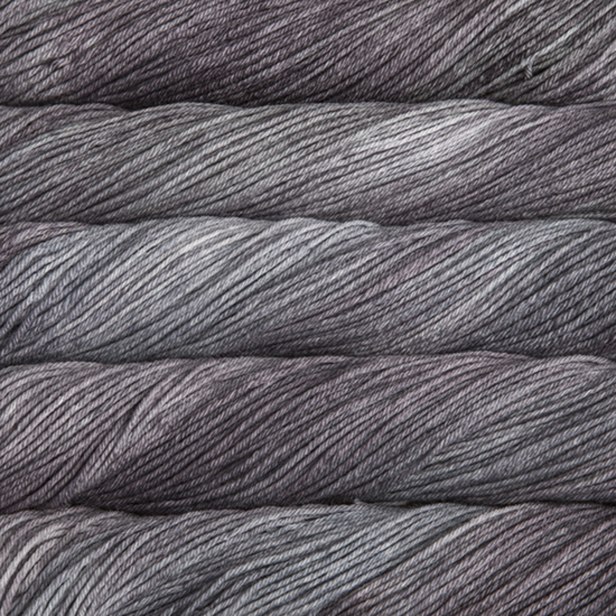 Malabrigo Sock Yarn in Plomo (SW043) – Dark gray hand-dyed Merino sock yarn from Revolution Fibers.