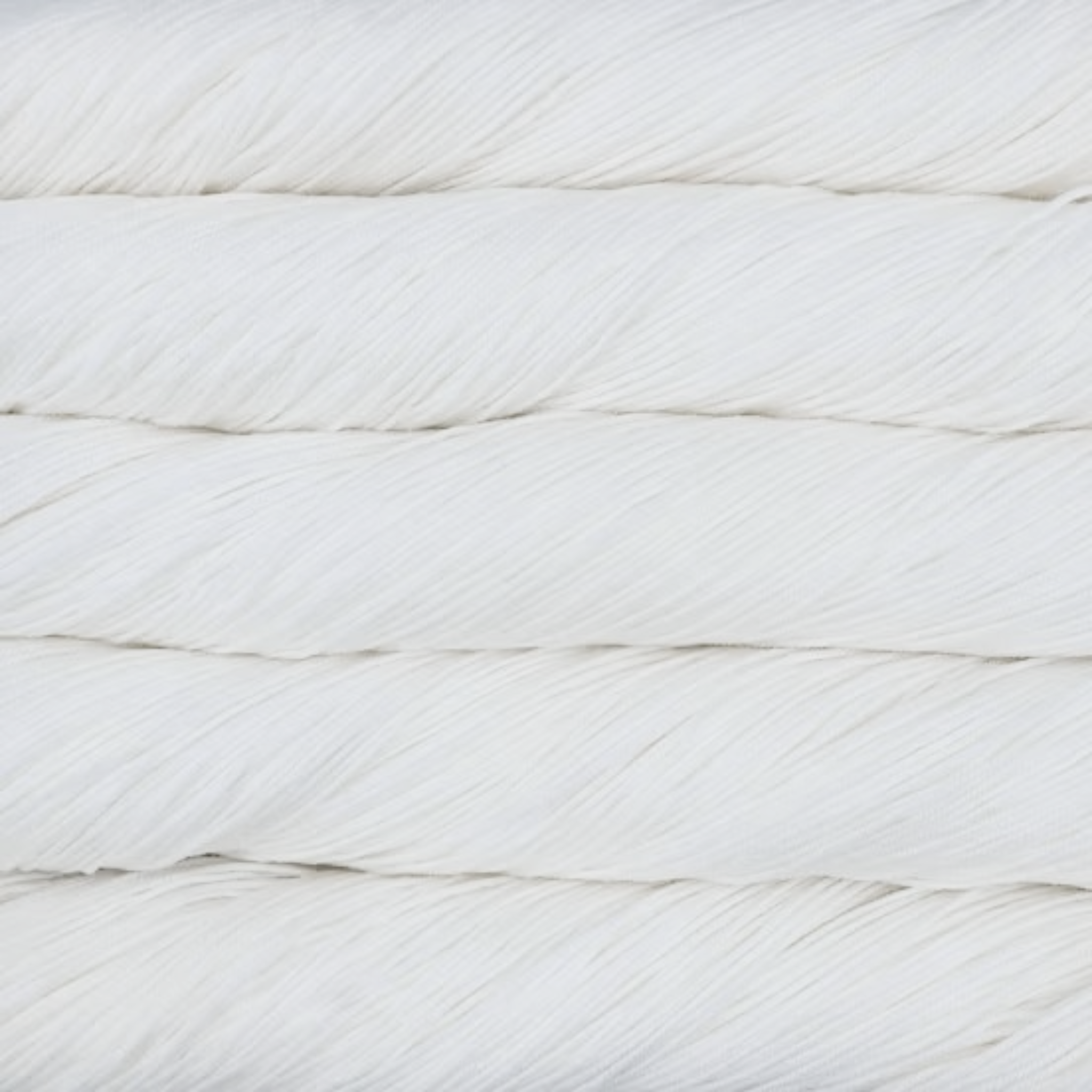 Malabrigo Sock Yarn White SW943 – Pure white fingering superwash Merino wool from Revolution Fibers.
