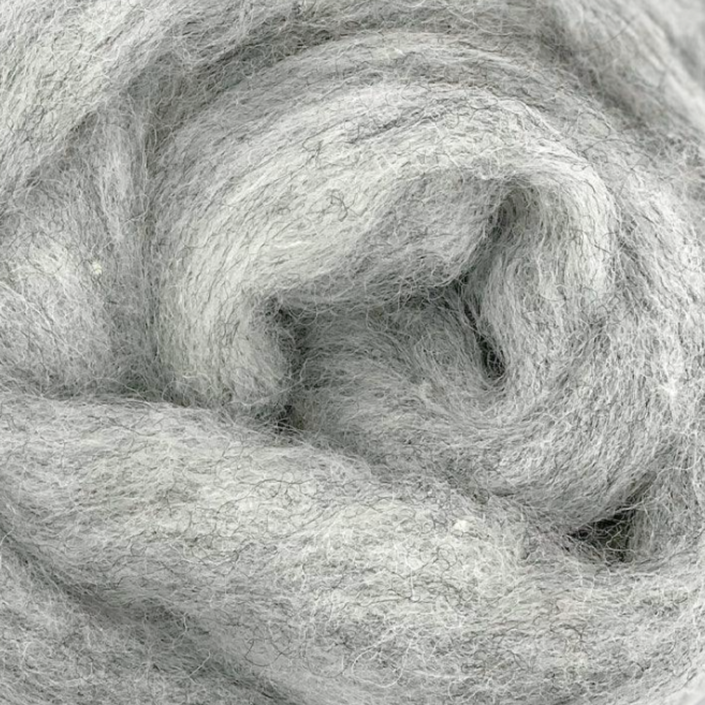 Drizzle colorway close-up, featuring soft gray carded Corriedale wool from Revolution Fibers' Woodland Neutrals pack.
