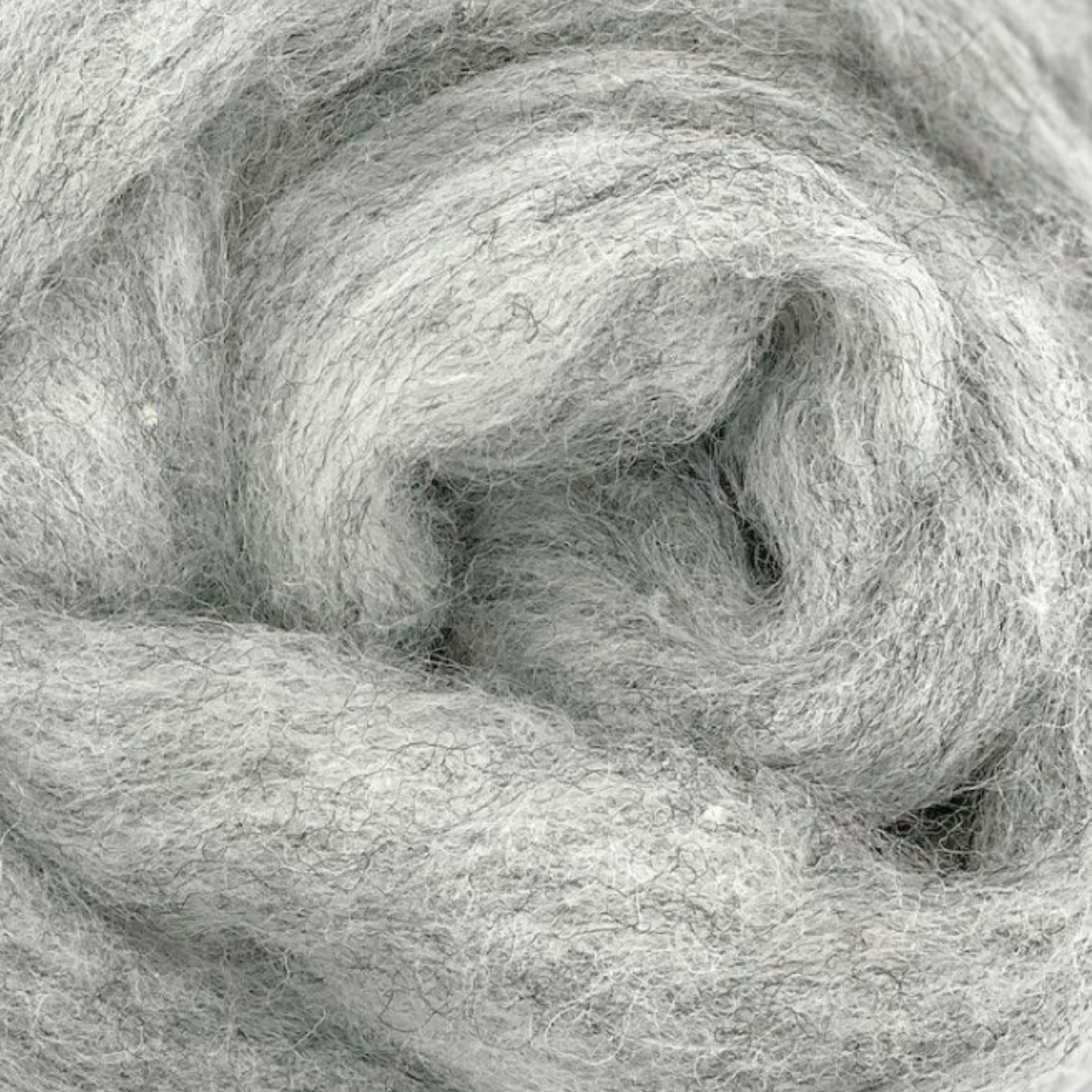 Drizzle colorway close-up, featuring soft gray carded Corriedale wool from Revolution Fibers' Woodland Neutrals pack.
