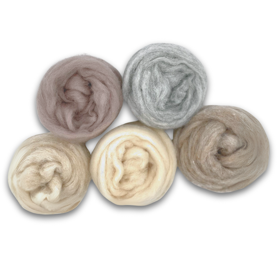 Rolled batts of Woodland Neutrals Corriedale wool sliver from Revolution Fibers showing natural earth tone fiber variety pack.