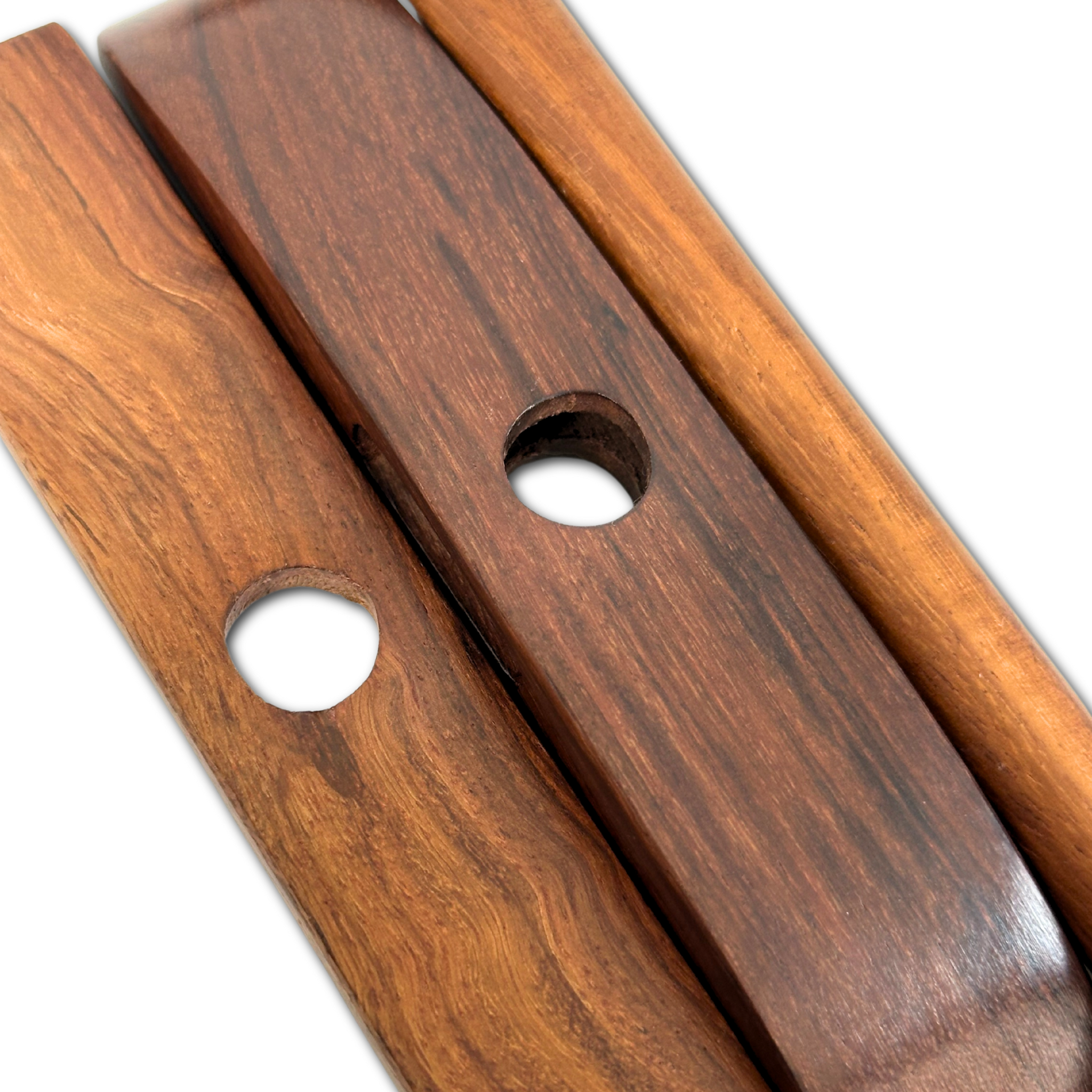 Macro close‑up of polished hardwood cross arm showing smooth finish and precision holes on the Revolution Fibers Turkish spindle.