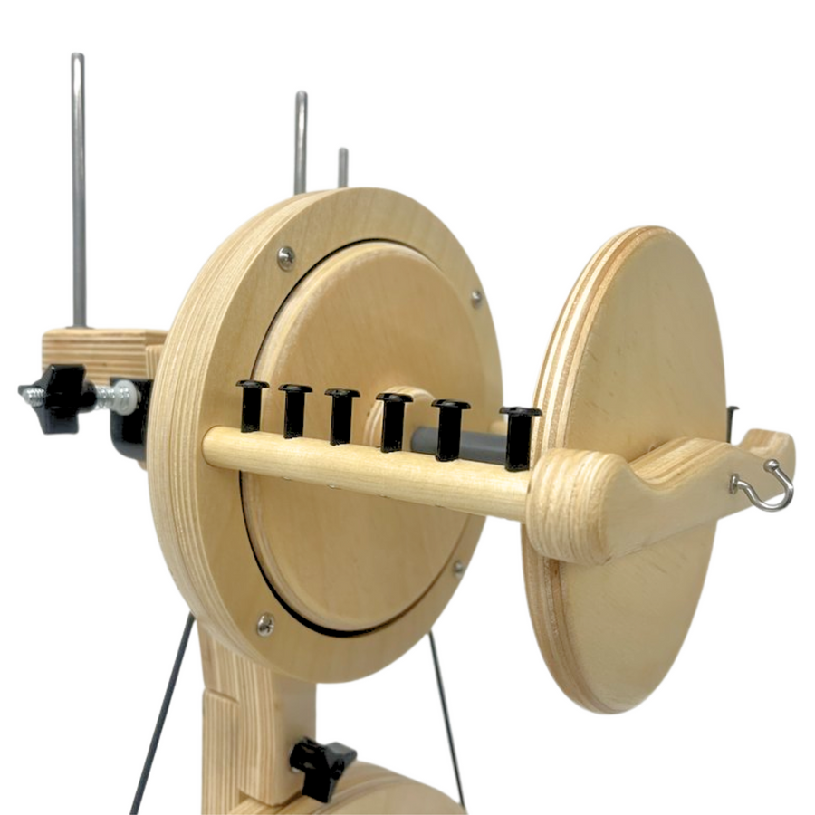 A close up look at SpinOlution's 12 oz flyer head attached to the Pollywog spinning wheel.