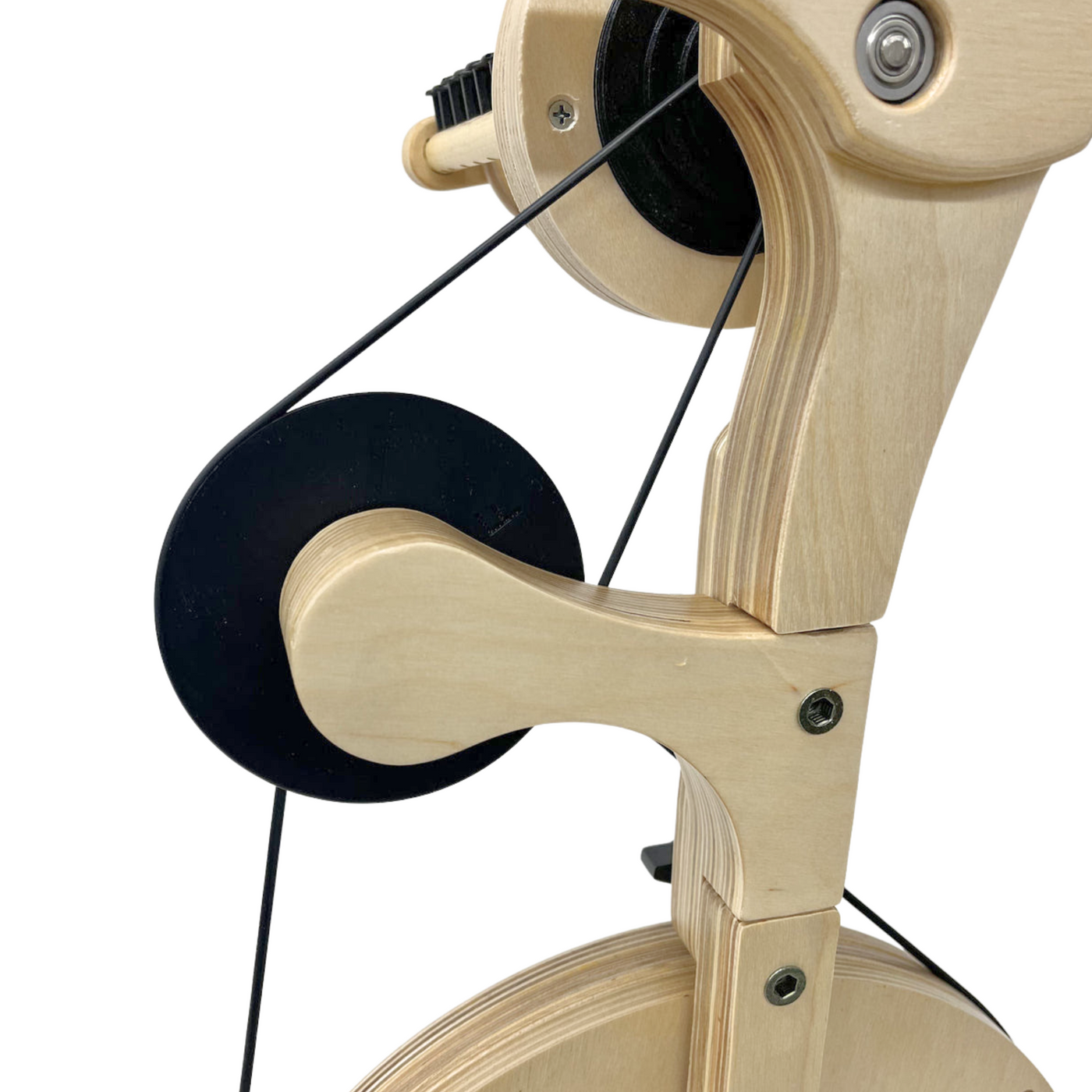 SpinOlution's New, as of July 2025, black 3D printed accelerator attached to the SpinOlution Pollywog Spinning Wheel. Back view.