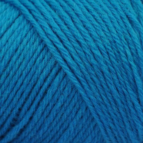 Wildfoote Luxury Sock Weight Superwash Cones | 1/2 LB, 968 yards per cone-Yarn-Brown Sheep Yarn-Blue Bird-Revolution Fibers